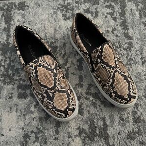 Snakeskin print slip on shoes